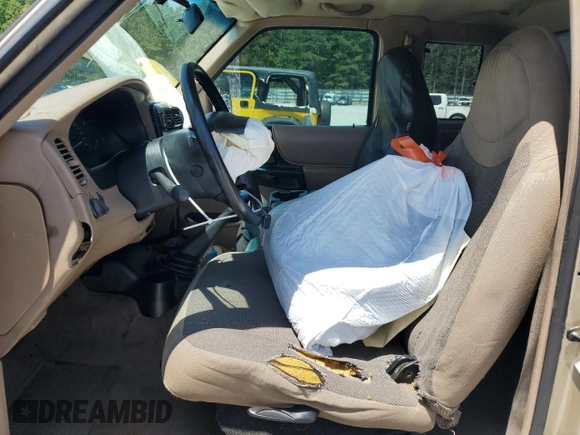 2000 Ford Ranger XL with VIN 1FTYR14VXYTA70121, listed as a Copart auction lot 56024985 with 271,426 mi miles and Salvage title. Bid and sale history available at DreamBid. Image 7.