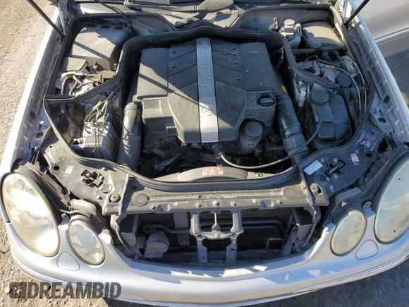 2003 Mercedes-Benz E-Class 3.2L with VIN WDBUF65J73X111272, listed as a Copart auction lot 73171144 with 113,738 mi miles and Salvage Title. Bid and sale history available at carsss.com. Image 12.