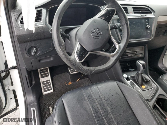 2023 Volkswagen Tiguan SE R-Line Black with VIN 3VVCB7AX7PM012828, listed as a Copart auction lot 45145365 with 44,254 mi miles and Salvage Title. Bid and sale history available at carsss.com. Image 8.