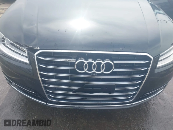2015 Audi A8 3.0T with VIN WAU3GAFD7FN037726, listed as a IAAI auction lot 41793699 with 100,773 mi miles and . Bid and sale history available at DreamBid. Image 6.