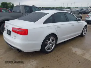 2014 Audi A6 Prestige with VIN WAUHGAFC6EN154497, listed as a IAAI auction lot 42189308 with 97,472 mi miles and . Bid and sale history available at DreamBid. Image 4.
