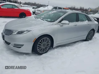 2014 Lincoln MKZ z VIN 3LN6L2JK9ER813109, wystawiony jako IAAI lot #41444866 z przebiegiem 128 613 mil mil oraz . Historia ofert i sprzedaży dostępna na DreamBid. Obrazek 18.