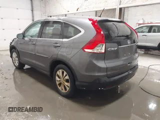 2013 Honda CR-V EX with VIN 2HKRM4H59DH682484, listed as a IAAI auction lot 41504589 with 208,260 mi miles and . Bid and sale history available at DreamBid. Image 3.