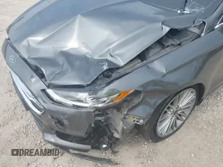 2016 Ford Fusion SE with VIN 3FA6P0T99GR276791, listed as a IAAI auction lot 42445910 with 117,355 mi miles and . Bid and sale history available at DreamBid. Image 6.