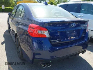 2021 Subaru WRX Premium with VIN JF1VA1C63M9814059, listed as a IAAI auction lot 42039228 with 87,437 mi miles. Bid and sale history available at carsss.com. Image 3.