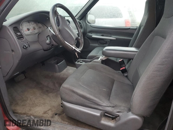 2001 Ford Explorer Sport z VIN 1FMYU60E91UC97278, wystawiony jako Copart lot #88458495 z przebiegiem 210 260 mil mil oraz Szkoda całkowita • Salvage title. Historia ofert i sprzedaży dostępna na DreamBid. Obrazek 7.