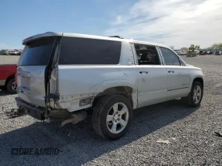 2015 Chevrolet Suburban LTZ with VIN 1GNSKKKC1FR120164, listed as a Copart auction lot 53700455 with 195,815 mi miles and Salvage Title. Bid and sale history available at DreamBid. Image 3.