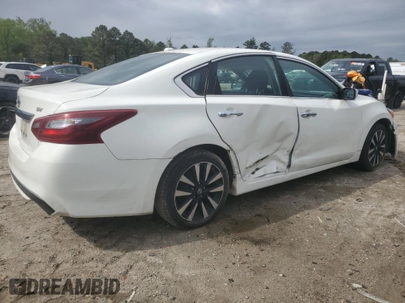 2018 Nissan Altima SV with VIN 1N4AL3AP9JC177614, listed as a Copart auction lot 52033385 with 216,463 mi miles and Clean Title. Bid and sale history available at DreamBid. Image 3.