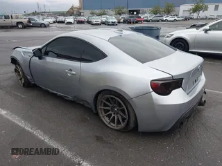 2016 Scion FR-S with VIN JF1ZNAA1XG8709798, listed as a IAAI auction lot 41713314 with 139,450 mi miles. Bid and sale history available at carsss.com. Image 3.