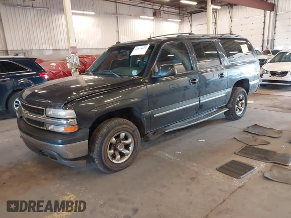 2004 Chevrolet Suburban LT z VIN 1GNFK16Z64J268977, wystawiony jako IAAI lot #41573029 z przebiegiem 181 923 mil mil oraz . Historia ofert i sprzedaży dostępna na DreamBid. Obrazek 17.