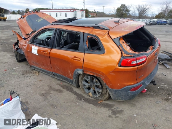 2015 Jeep Cherokee Trailhawk z VIN 1C4PJMBS9FW750858, wystawiony jako IAAI lot #41741305 z przebiegiem Nie podano mil oraz . Historia ofert i sprzedaży dostępna na DreamBid. Obrazek 3.