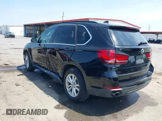 2015 BMW X5 sDrive35i with VIN 5UXKR2C50F0H39042, listed as a IAAI auction lot 42027819 with 152,239 mi miles. Bid and sale history available at carsss.com. Image 3.