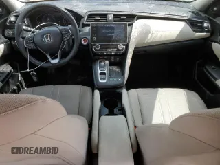 2022 Honda Insight Touring z VIN 19XZE4F95NE002847, wystawiony jako Copart lot #51352875 z przebiegiem 53 229 mil mil oraz Czysty tytuł • Clean title. Historia ofert i sprzedaży dostępna na DreamBid. Obrazek 8.