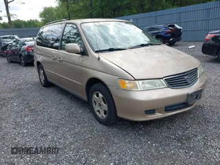 2001 Honda Odyssey EX z VIN 2HKRL18621H595774, wystawiony jako IAAI lot #42767980 z przebiegiem 208 012 mil mil oraz . Historia ofert i sprzedaży dostępna na DreamBid. Obrazek 1.
