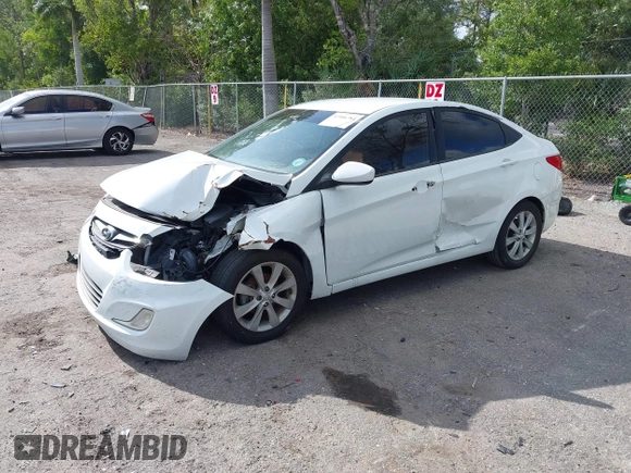 2014 Hyundai Accent GLS with VIN KMHCU4AE8EU608539, listed as a IAAI auction lot 41946784 with 106,709 mi miles and . Bid and sale history available at carsss.com. Image 17.