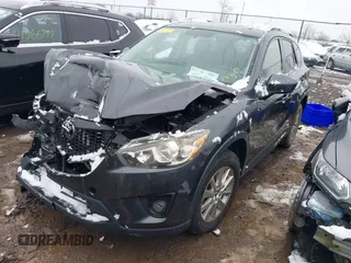 2014 Mazda CX-5 Touring with VIN JM3KE2CY2E0407453, listed as a IAAI auction lot 41564916 with 104,852 mi miles. Bid and sale history available at carsss.com. Image 16.
