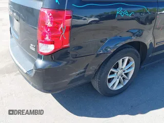 2014 Dodge Grand Caravan SXT with VIN 2C4RDGCG4ER341699, listed as a IAAI auction lot 42064523 with 234,422 mi miles and . Bid and sale history available at DreamBid. Image 12.