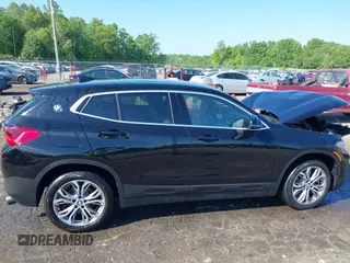 2018 BMW X2 sDrive28i z VIN WBXYJ3C34JEJ84230, wystawiony jako IAAI lot #42146469 z przebiegiem 53 369 mil mil oraz . Historia ofert i sprzedaży dostępna na DreamBid. Obrazek 13.