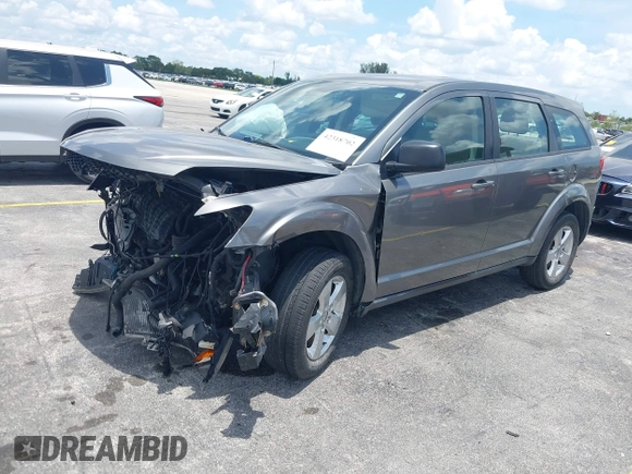 2013 Dodge Journey SE with VIN 3C4PDCAB3DT626929, listed as a IAAI auction lot 42318702 with Not provided miles and . Bid and sale history available at DreamBid. Image 2.