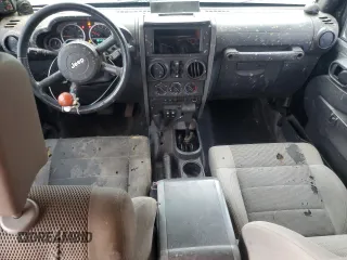 2007 Jeep Wrangler Unlimited Rubicon with VIN 1J4GA69117L112867, listed as a Copart auction lot 59909565 with 166,963 mi miles and Salvage title. Bid and sale history available at DreamBid. Image 8.