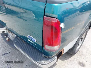 1997 Ford F-150 with VIN 1FTDF1722VNB40056, listed as a IAAI auction lot 42502044 with 155,836 mi miles and . Bid and sale history available at DreamBid. Image 15.