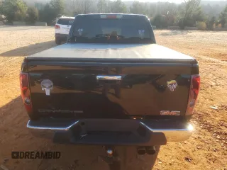 2012 GMC Canyon SLE1 with VIN 1GTD5MF90C8133699, listed as a Copart auction lot 42194595 with 111,141 mi miles and Salvage Title. Bid and sale history available at carsss.com. Image 6.