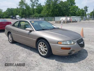 1999 Chrysler Sebring LXi z VIN 4C3AU52N0XE110884, wystawiony jako IAAI lot #42463909 z przebiegiem 100 762 mil mil oraz . Historia ofert i sprzedaży dostępna na DreamBid. Obrazek 1.