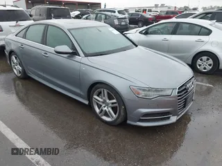 2016 Audi A6 Premium Plus z VIN WAUGFAFC3GN106053, wystawiony jako IAAI lot #42103423 z przebiegiem 43 756 mil mil oraz . Historia ofert i sprzedaży dostępna na DreamBid. Obrazek 1.