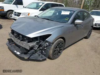 2016 Mazda Mazda3 i Sport with VIN JM1BM1T71G1335980, listed as a IAAI auction lot 42003186 with 131,015 mi miles. Bid and sale history available at carsss.com. Image 17.