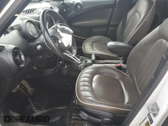 2014 MINI Countryman S with VIN WMWZC3C53EWP27156, listed as a Copart auction lot 59579765 with 159,308 mi miles and Salvage title. Bid and sale history available at DreamBid. Image 7.