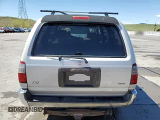 1997 Toyota 4Runner SR5 z VIN JT3HN86RXV0057844, wystawiony jako Copart lot #55357775 z przebiegiem 308 521 mil mil oraz Szkoda całkowita • Salvage title. Historia ofert i sprzedaży dostępna na DreamBid. Obrazek 6.