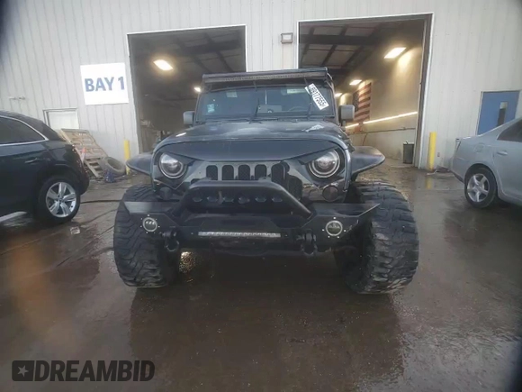 2008 Jeep Wrangler Unlimited X с VIN 1J8GA39138L562843, выставлен на аукционе Copart как лот 89177555 с пробегом 159 560 миль миль и Списание • Salvage title. История ставок и продаж доступна на DreamBid. Изображение 13.
