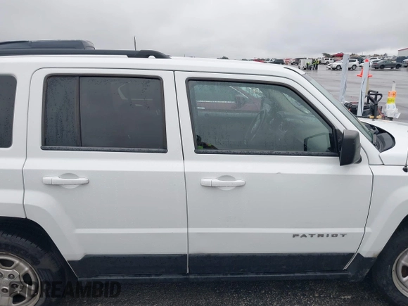 2012 Jeep Patriot Sport with VIN 1C4NJPBAXCD639209, listed as a IAAI auction lot 41539883 with 244,585 mi miles and . Bid and sale history available at DreamBid. Image 13.