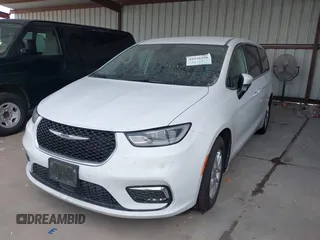 2023 Chrysler Pacifica Touring L with VIN 2C4RC1BG6PR550575, listed as a IAAI auction lot 42576498 with 54,373 mi miles and . Bid and sale history available at DreamBid. Image 22.