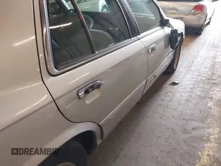 2000 Mercury Grand Marquis LS z VIN 2MEFM75W0YX736324, wystawiony jako IAAI lot #41865927 z przebiegiem 136 886 mil mil oraz . Historia ofert i sprzedaży dostępna na DreamBid. Obrazek 6.