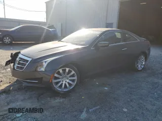 2015 Cadillac ATS Standard AWD z VIN 1G6AG1RX6F0123027, wystawiony jako Copart lot #75849154 z przebiegiem 40 857 mil mil oraz Szkoda całkowita • Salvage title. Historia ofert i sprzedaży dostępna na DreamBid. Obrazek 1.