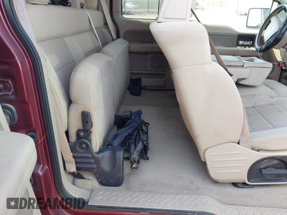 2005 Ford F-150 XLT with VIN 1FTPX12505FB69853, listed as a IAAI auction lot 42092756 with 330,699 mi miles. Bid and sale history available at carsss.com. Image 8.