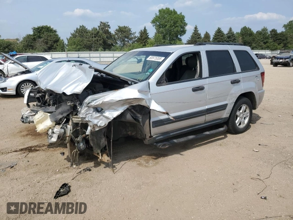 2005 Jeep Grand Cherokee Laredo z VIN 1J4GR48KX5C581833, wystawiony jako Copart lot #60975355 z przebiegiem 149 993 mil mil oraz Szkoda całkowita • Salvage title. Historia ofert i sprzedaży dostępna na DreamBid. Obrazek 1.