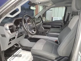 2023 Ford F-150 XL with VIN 1FTFW1E59PFA41530, listed as a IAAI auction lot 41956614 with 127,220 mi miles. Bid and sale history available at carsss.com. Image 1.