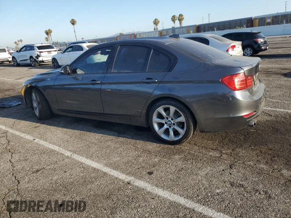 2015 BMW 3 Series 328i with VIN WBA3C1C51FP116967, listed as a Copart auction lot 65348565 with 93,052 mi miles and Salvage title. Bid and sale history available at DreamBid. Image 2.