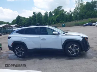 2022 Hyundai Tucson SEL Convenience with VIN KM8JFCA1XNU057877, listed as a IAAI auction lot 42256860 with 54,425 mi miles and . Bid and sale history available at DreamBid. Image 14.