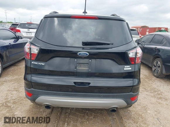 2018 Ford Escape SEL with VIN 1FMCU0HD0JUB24722, listed as a IAAI auction lot 42049106 with 122,400 mi miles and . Bid and sale history available at carsss.com. Image 16.