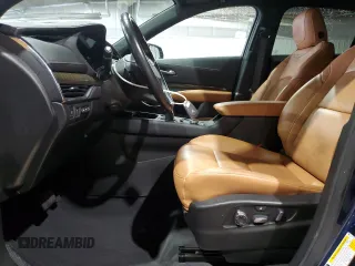 2021 Cadillac XT4 AWD Premium Luxury with VIN 1GYFZDR41MF031543, listed as a Copart auction lot 61085805 with 21,318 mi miles and Salvage title. Bid and sale history available at DreamBid. Image 7.