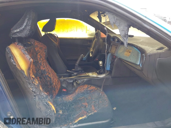 2014 Scion FR-S z VIN JF1ZNAA10E9701121, wystawiony jako IAAI lot #42128884 z przebiegiem 133 634 mil mil oraz . Historia ofert i sprzedaży dostępna na DreamBid. Obrazek 5.