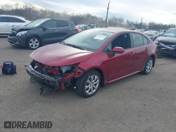 2023 Toyota Corolla Hybrid LE with VIN JTDBCMFE2PJ003738, listed as a IAAI auction lot 41620152 with 4,926 mi miles. Bid and sale history available at carsss.com. Image 2.