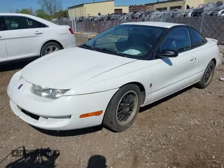 1997 Saturn SC z VIN 1G8ZH1270VZ235219, wystawiony jako IAAI lot #42229262 z przebiegiem 107 874 mil mil oraz . Historia ofert i sprzedaży dostępna na DreamBid. Obrazek 2.