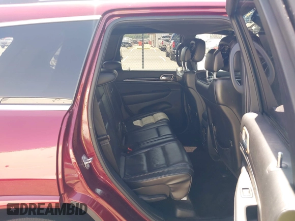 2017 Jeep Grand Cherokee Overland with VIN 1C4RJFCG7HC658943, listed as a IAAI auction lot 42282213 with 103,291 mi miles and . Bid and sale history available at DreamBid. Image 8.