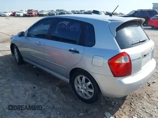 2006 Kia Spectra with VIN KNAFE161365208111, listed as a IAAI auction lot 41886193 with 292,535 mi miles. Bid and sale history available at carsss.com. Image 3.