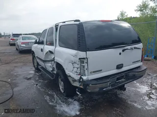 2005 Chevrolet Tahoe Z71 with VIN 1GNEC13T85R203611, listed as a IAAI auction lot 39482026 with 264,918 mi miles. Bid and sale history available at carsss.com. Image 3.
