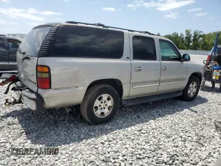 2005 Chevrolet Suburban LT z VIN 3GNEC16Z15G280353, wystawiony jako Copart lot #53974785 z przebiegiem 389 849 mil mil oraz Nie do naprawy. Historia ofert i sprzedaży dostępna na DreamBid. Obrazek 3.